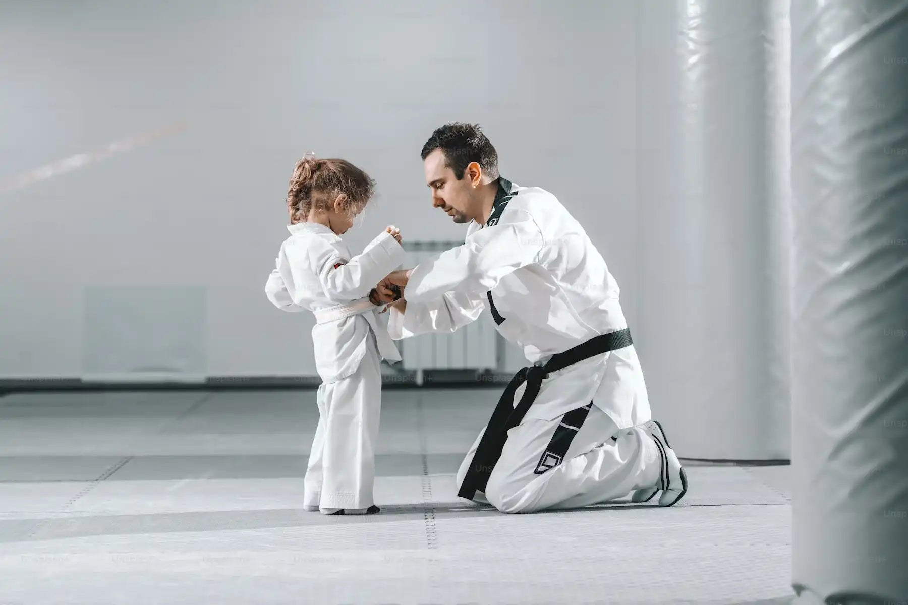 Children showing respect before martial arts class
